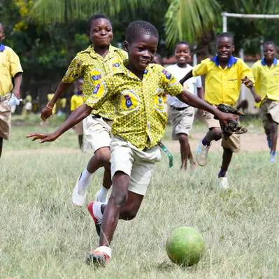 children playing with footballs